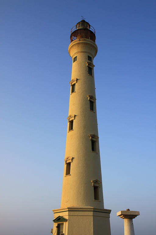 The old stone California lighthouse stands as a silent sentry in the area known as "Hudishibana," near the island's northwestern tip. - California Dunes