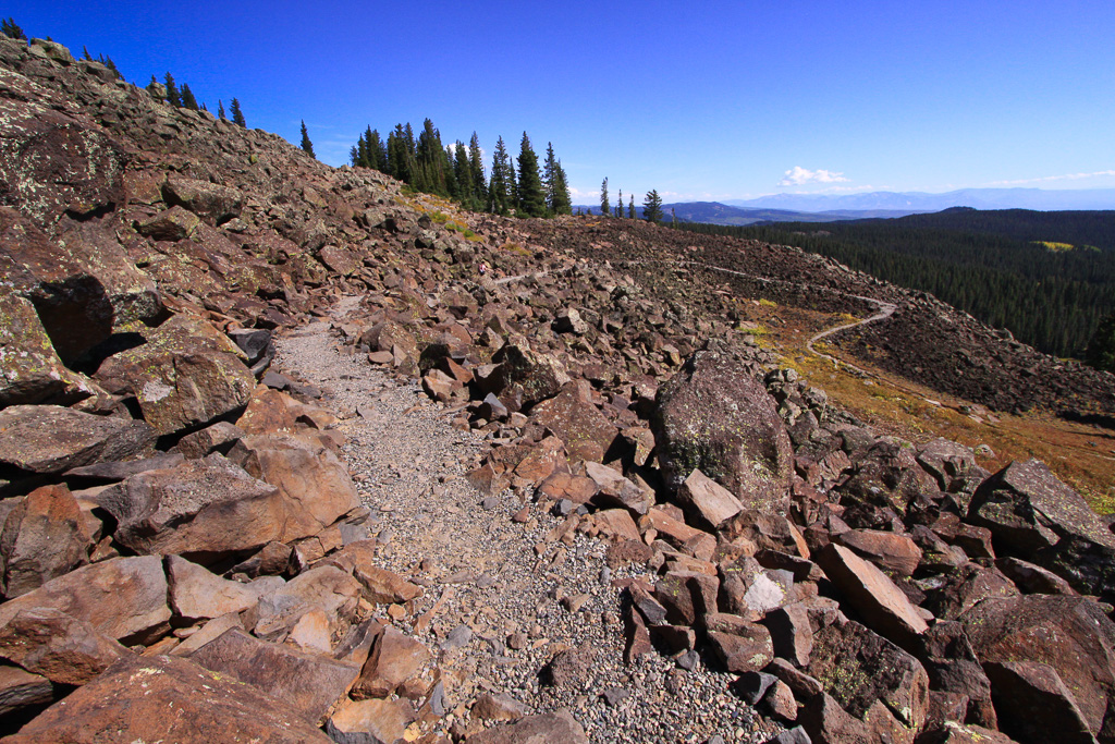 Descending the winding trail through the boulders - Crag Crest Trail
