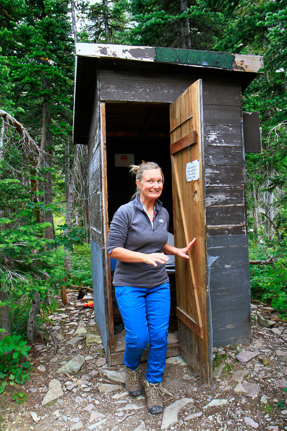 Sook emerging from outhouse - Iceberg Lake